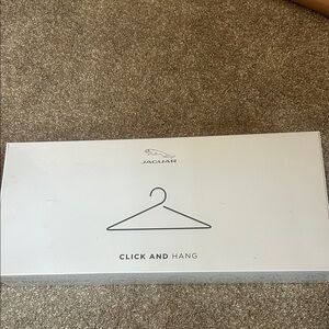 Jaguar OEM Click & Hang – Coat Hanger Attachment (Brand New in Box)
